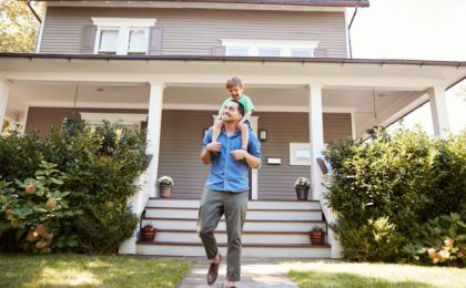 Family enjoying outside their home without worry of bugs